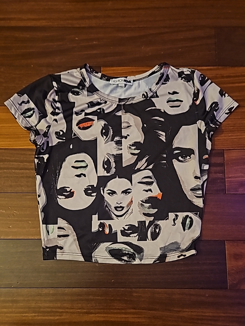 Fashion Nova Monochrome Graphic Face Print Crop Top with Orange Accents
